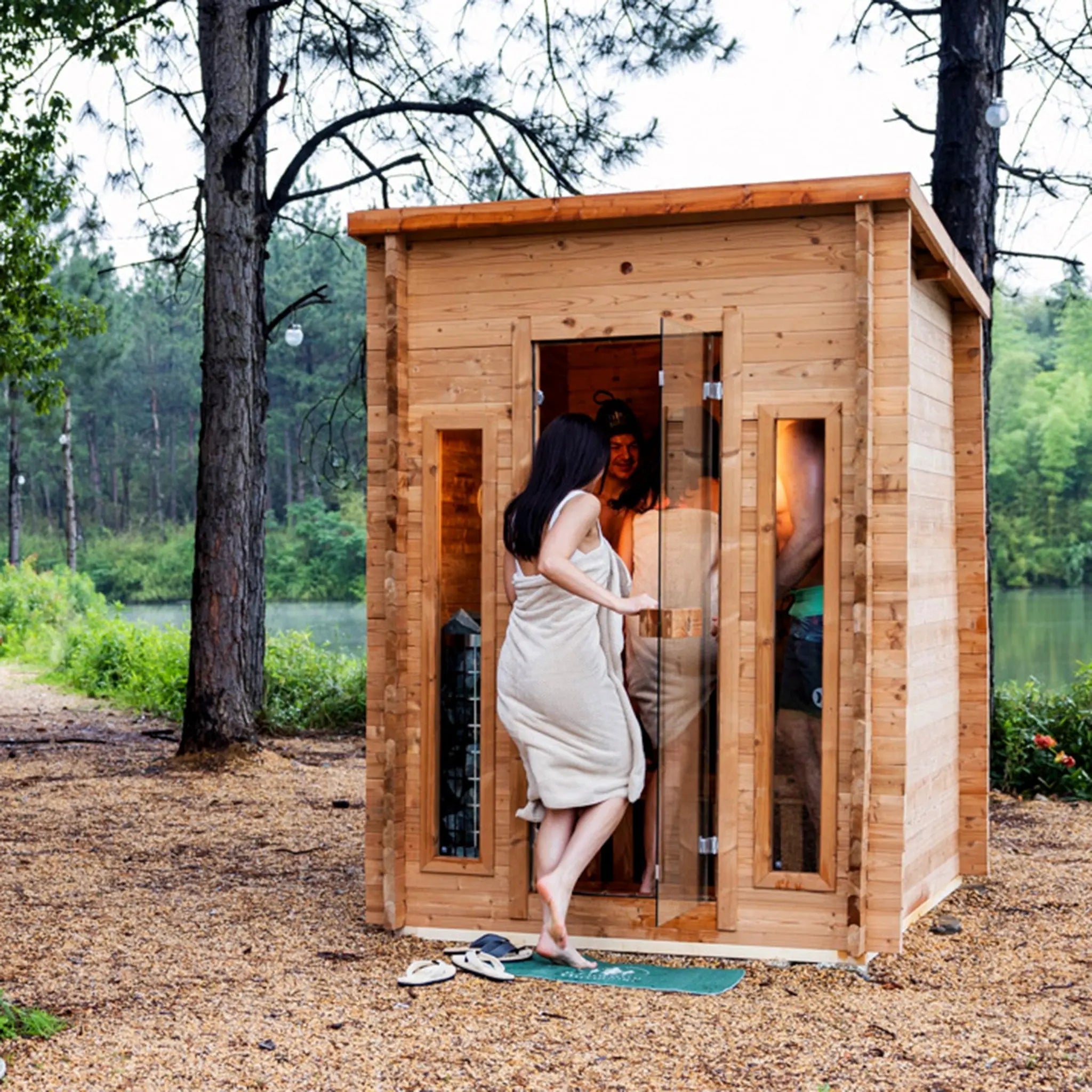 Redwood Outdoors cabin outdoor sauna in a backyard setting