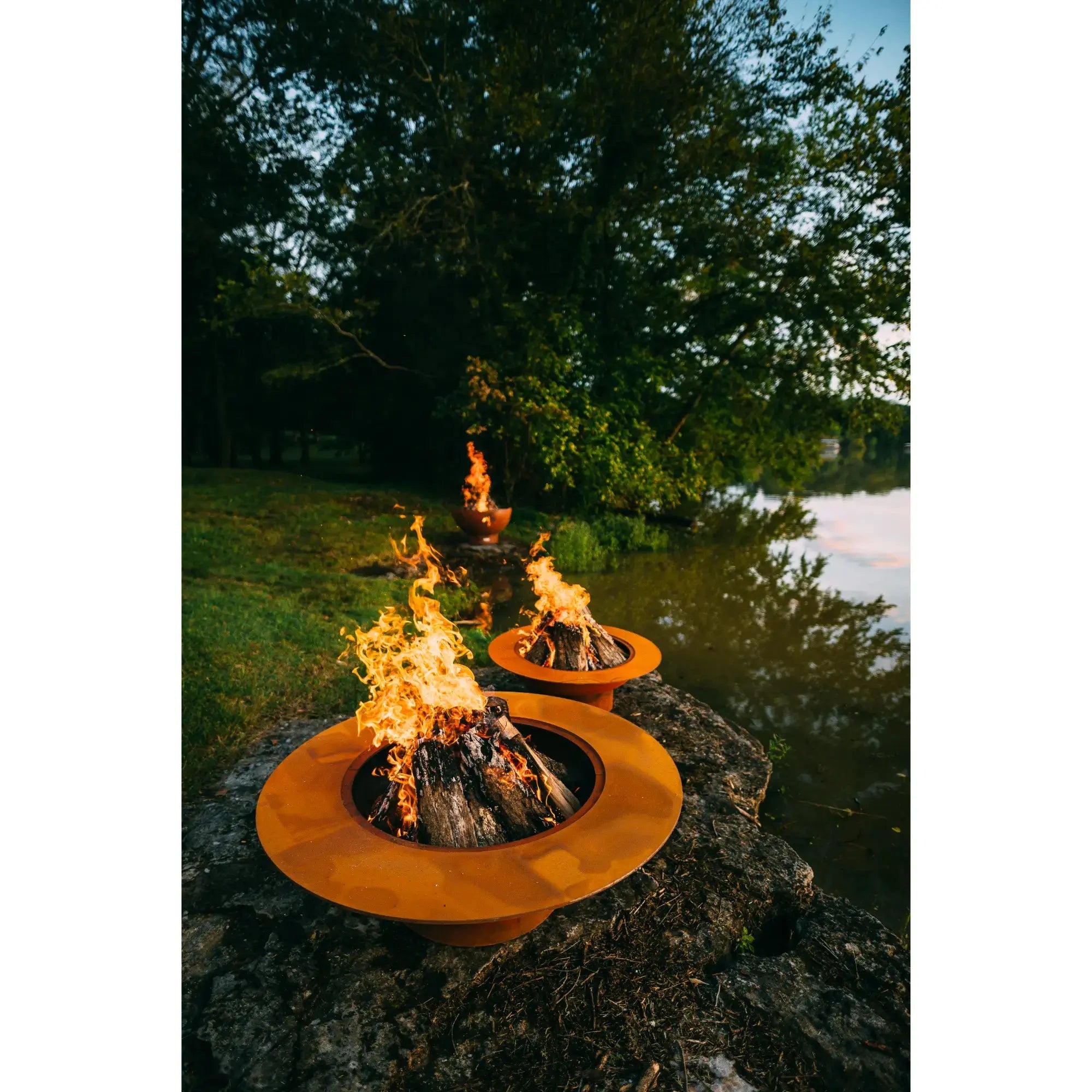 Magnum 54″ Round Wood Burning Fire Pit – Carbon Steel by Fire Pit Art Fire Pit Art