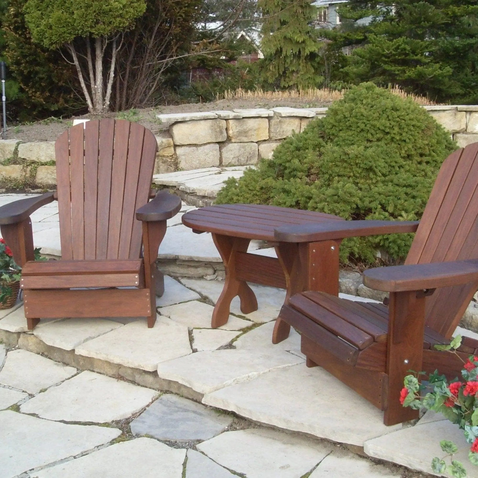 adirondack chairs with side table outdoors