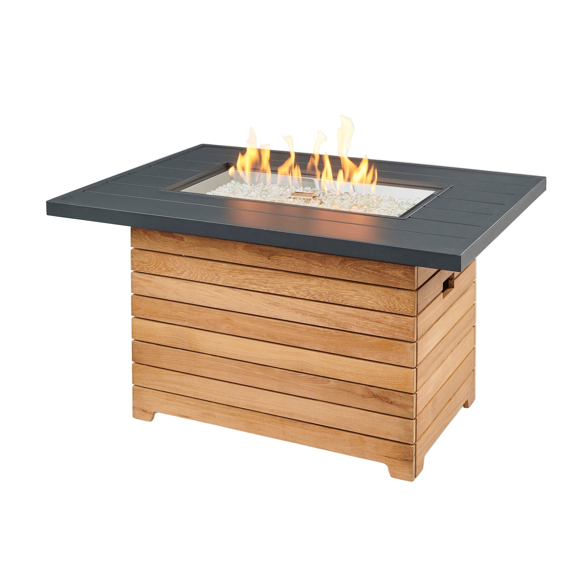 A rectangular gas fire pit table with a teak wood base and a gray concrete top, featuring visible flames from the fire pit.