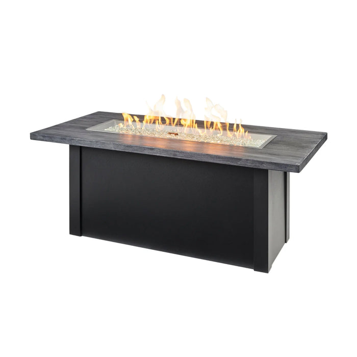 Linear concrete-look fire pit table with vibrant flames — rectangular gas fire pit table from The Outdoor GreatRoom Company