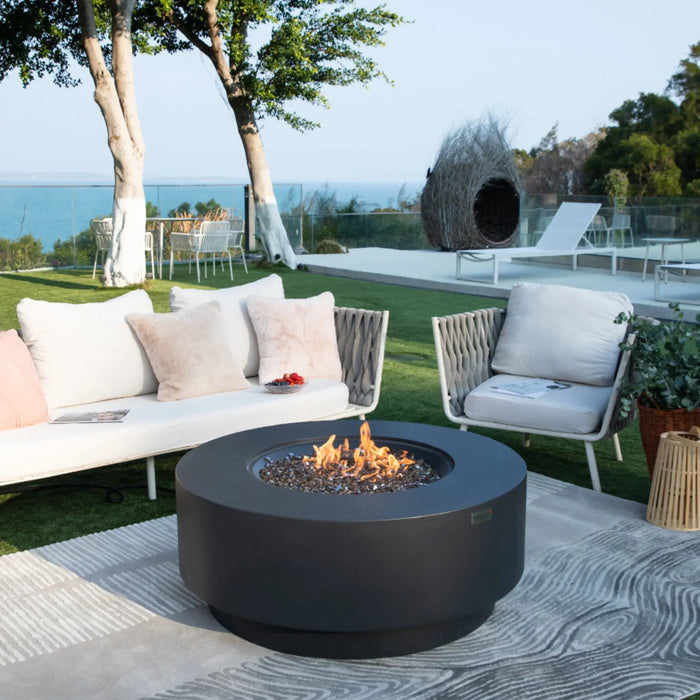 Nimes fire pit table in dark grey — modern square gas fire pit table with a sleek concrete finish for contemporary patios