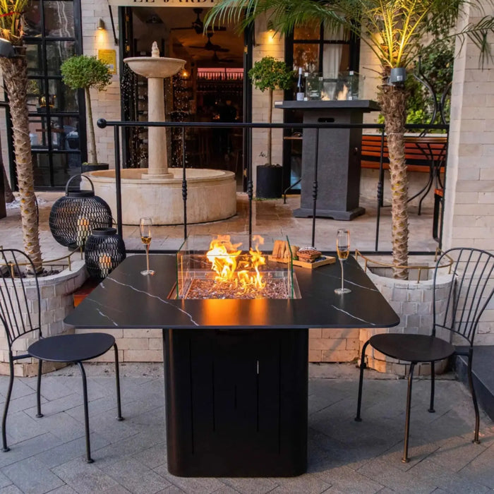 Elementi Plus Brugge marble porcelain fire pit dining table in Bulgaria Black — premium square dining-height fire pit table with hidden propane tank storage