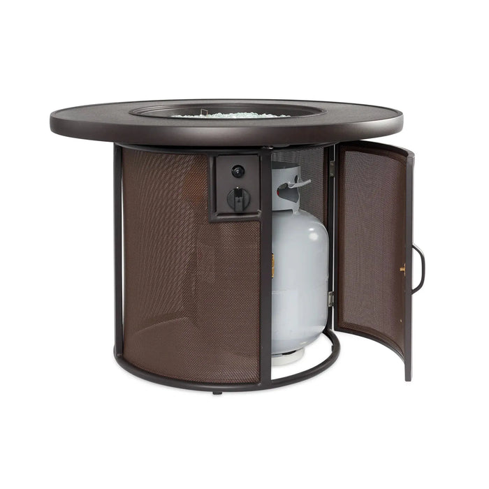 Round 32-inch fire pit with hidden tank storage door — circular gas fire pit featuring a discreet propane access panel